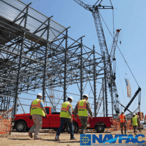A group of NAVFAC construction members at a job site