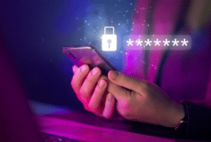 Hands holding a smartphone with a digital lock icon and obscured password on the screen.