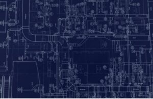 Blueprint showing detailed architectural plans in white lines on a dark blue background. 
