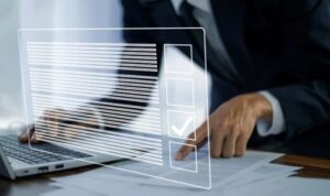 Businessperson working with documents and laptop, overlaid with a digital checklist and check mark